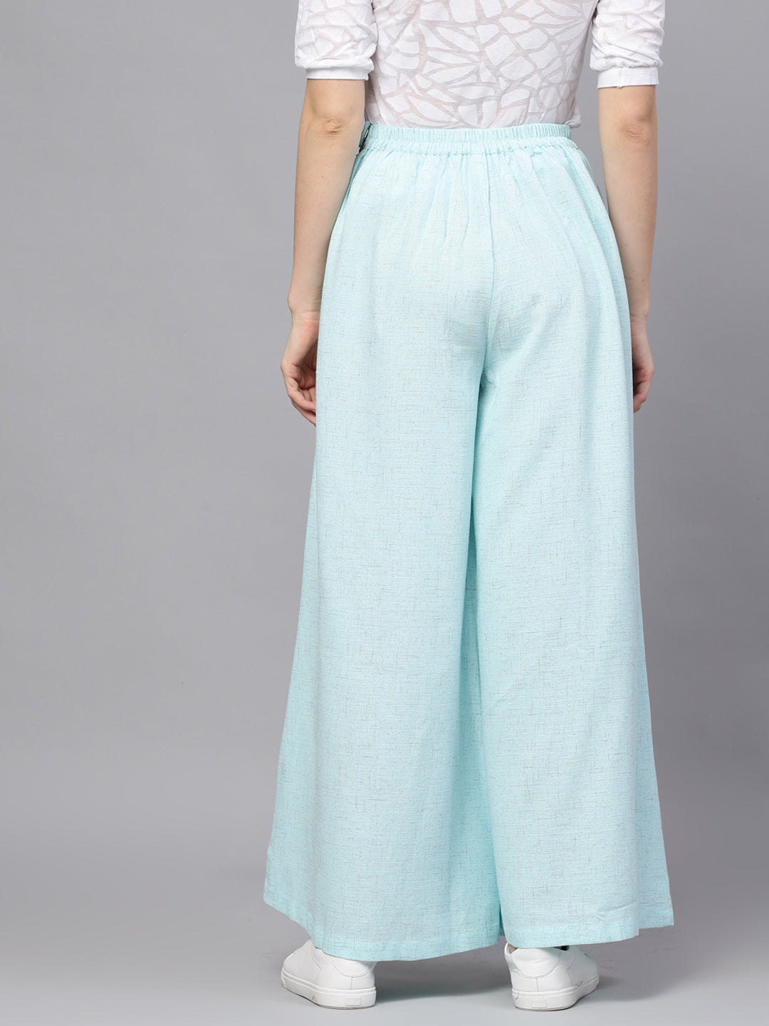 Blue Textured Mid-Rise Flared Palazzos - Elganza
