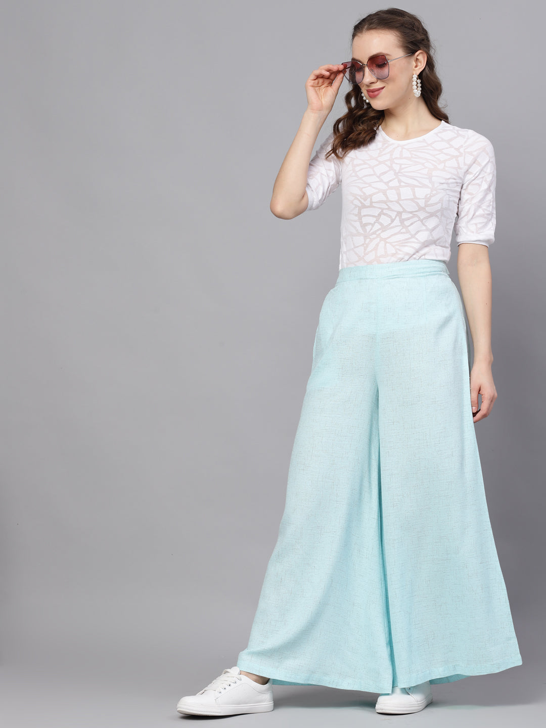 Blue Textured Mid-Rise Flared Palazzos - Elganza